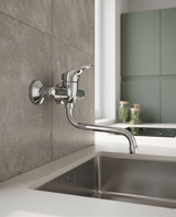 Trend - Monocomando lavello a muro con canna a "S" da 18cm